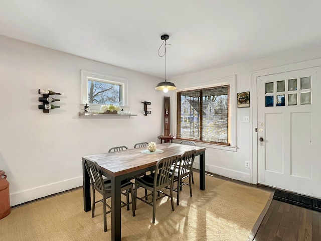 dining area with light hardwood / wood-style flooring