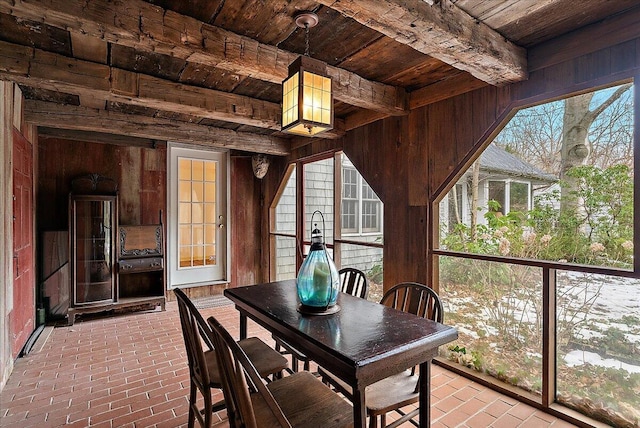 sunroom with wooden ceiling and beam ceiling