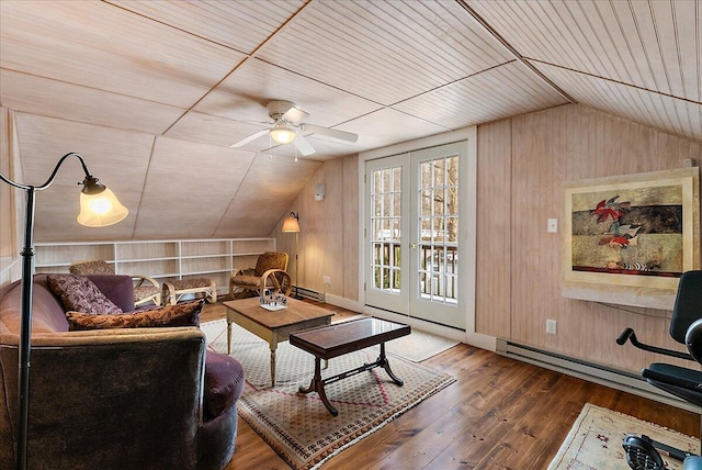 living room featuring wood-type flooring, vaulted ceiling, and wood walls