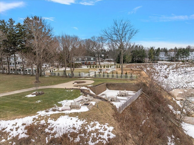 view of yard layered in snow