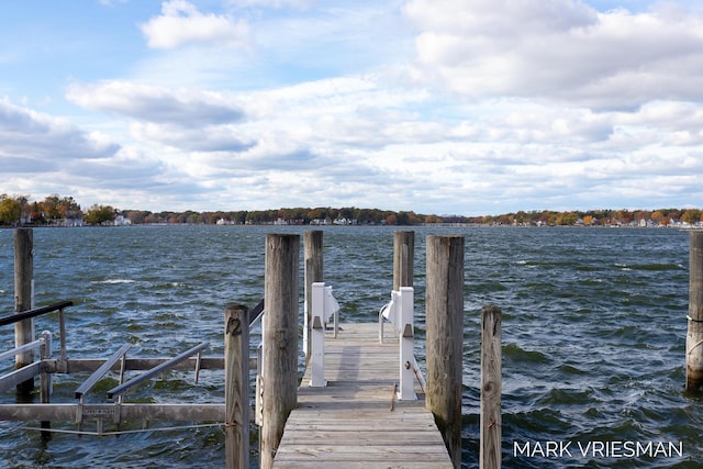 view of dock with a water view