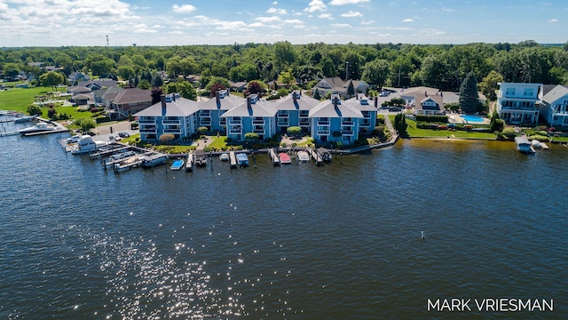 bird's eye view with a water view