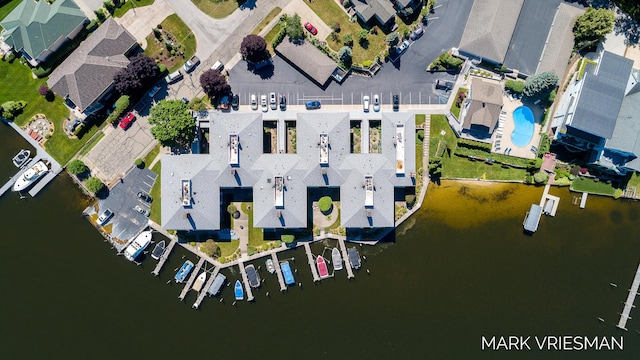 bird's eye view with a water view