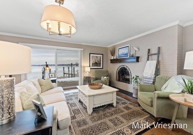 living room with crown molding and a water view