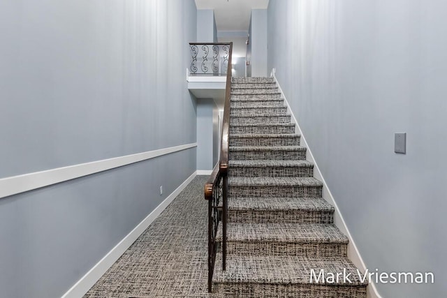 stairway with carpet floors