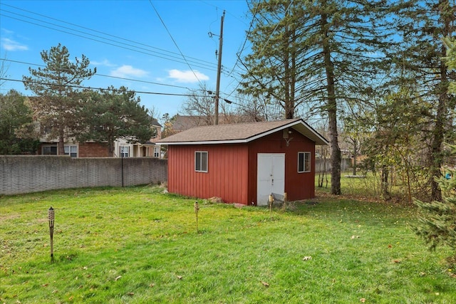 view of outdoor structure featuring a yard