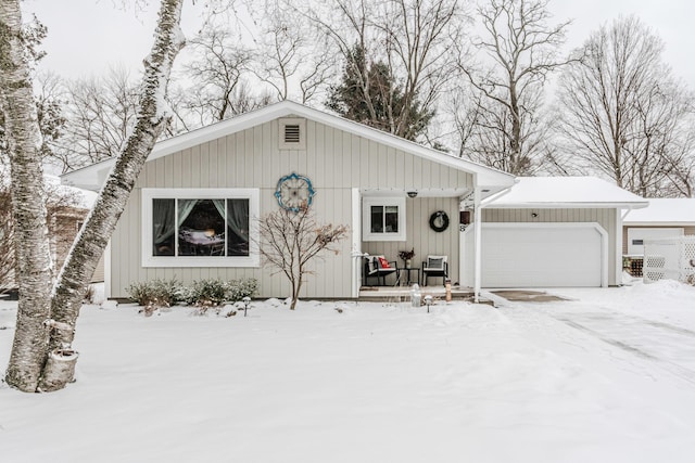 exterior space with a garage and covered porch