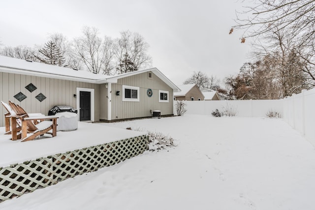 view of snow covered house