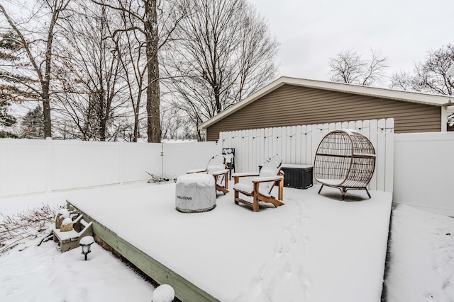 view of snow covered patio