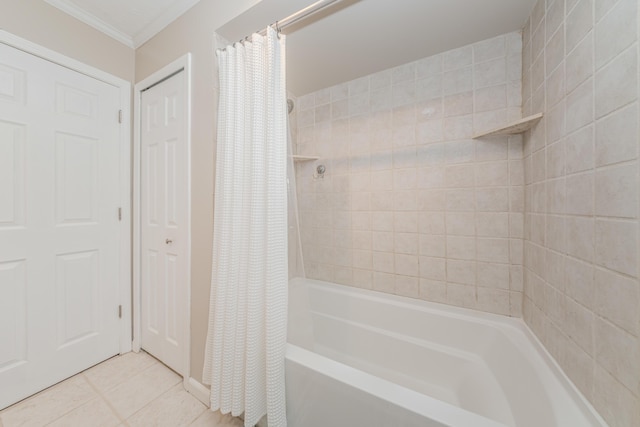 bathroom featuring tile patterned flooring, crown molding, and shower / bath combination with curtain