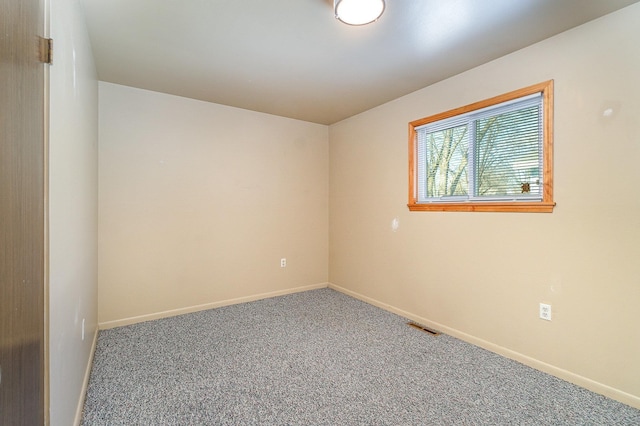 empty room featuring carpet