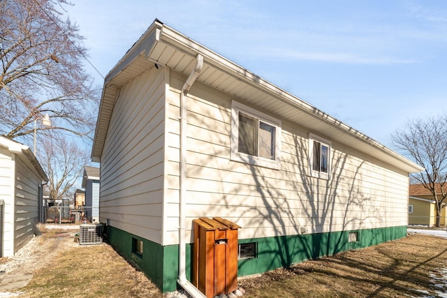 view of home's exterior with central AC