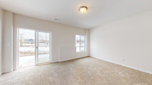 view of carpeted spare room