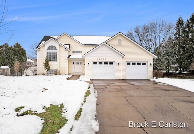 front facade with a garage