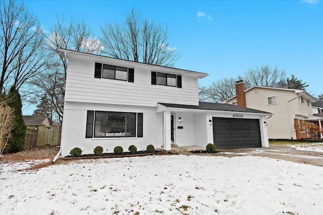 front of property featuring a garage