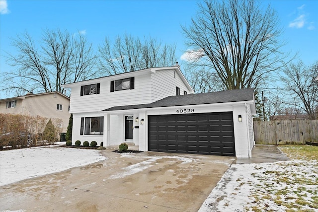 view of front of property featuring a garage