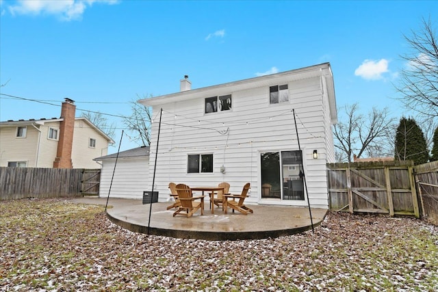 back of house featuring a patio area