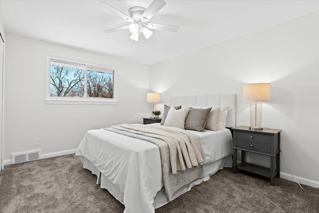 bedroom featuring dark colored carpet and ceiling fan