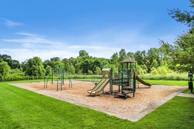 view of play area featuring a lawn