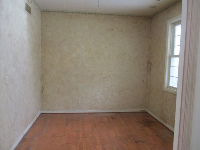 unfurnished room featuring dark wood-type flooring