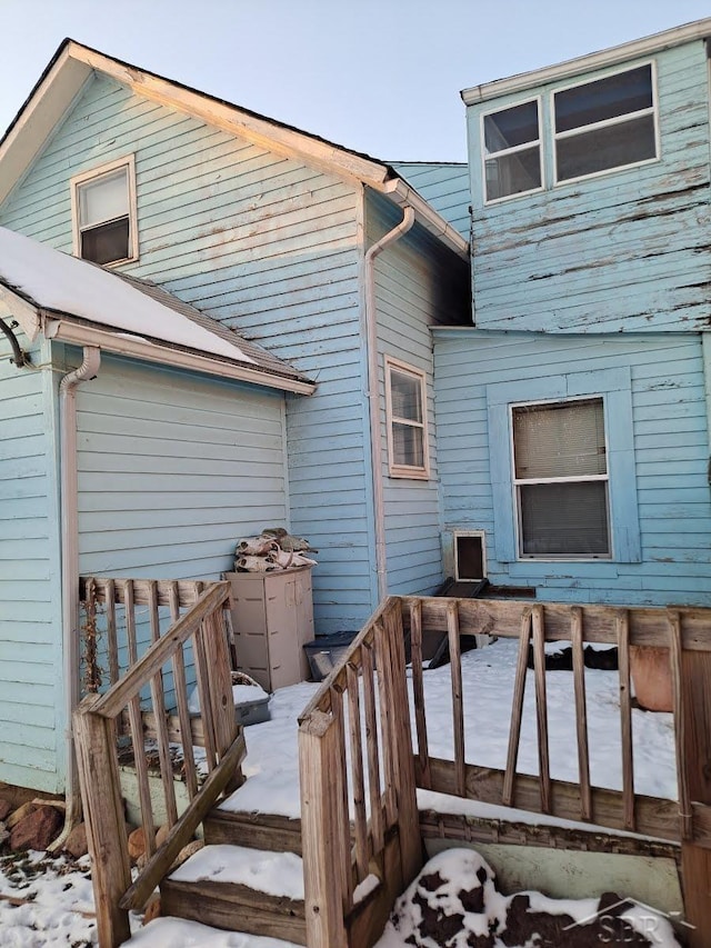 view of snow covered deck