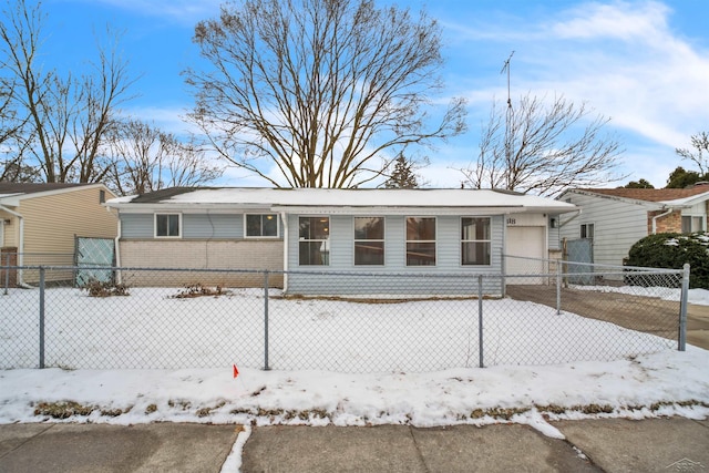 single story home with a garage