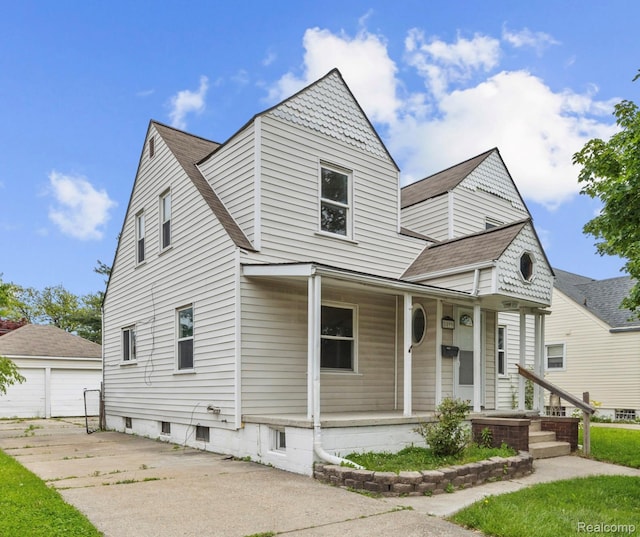 8099 Superior, Center Line, MI 48015 - view of front of property with covered porch, a detached garage, and an outdoor structure