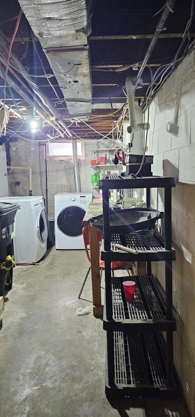 basement featuring washing machine and dryer