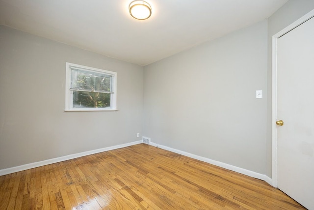 unfurnished room featuring light wood-type flooring