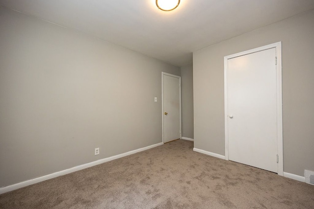 unfurnished bedroom featuring carpet floors