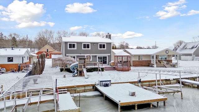 view of snow covered house