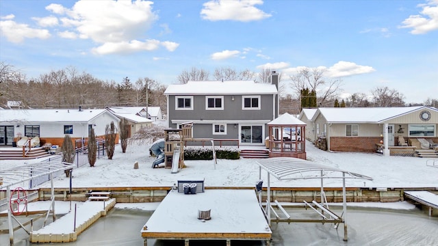 view of snow covered property