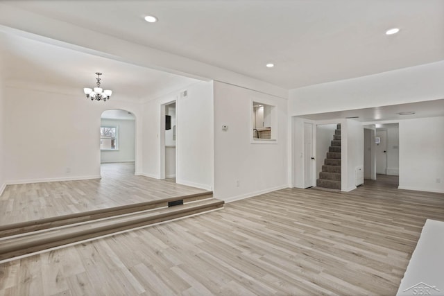 unfurnished living room featuring light hardwood / wood-style floors