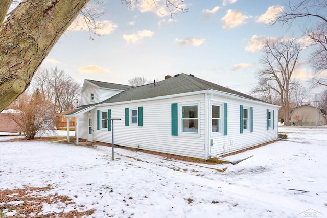 view of snow covered property