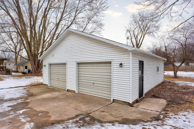 view of snow covered garage