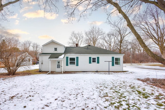 view of snow covered house