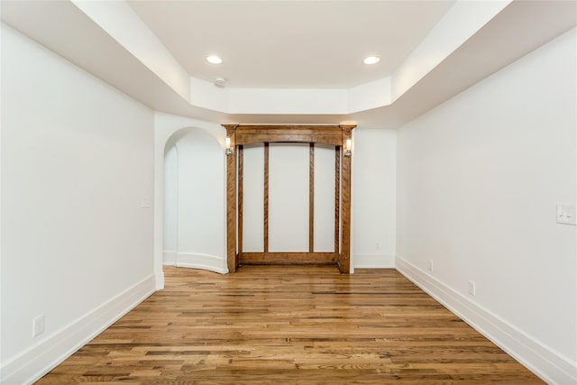 empty room featuring hardwood / wood-style floors