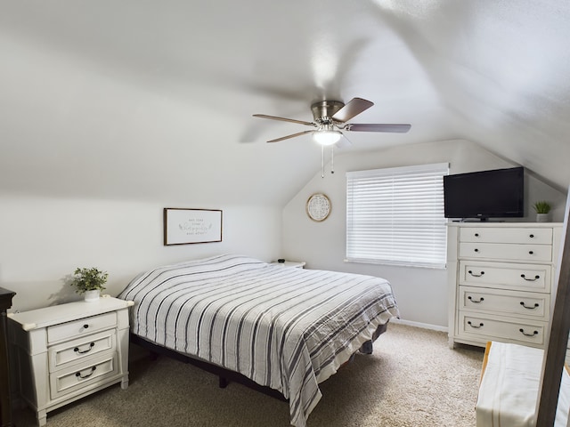 carpeted bedroom with baseboards, lofted ceiling, and ceiling fan