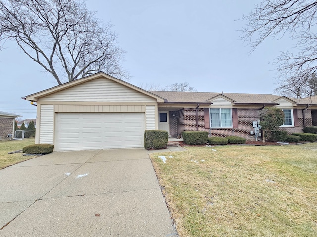 ranch-style home featuring a garage and a front lawn