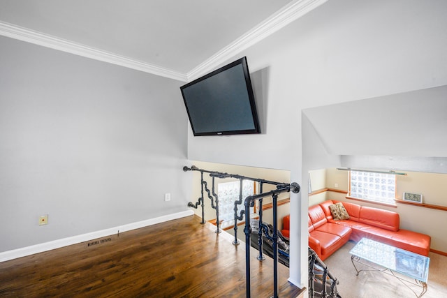 living room with ornamental molding and dark hardwood / wood-style floors