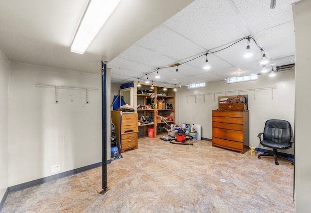 basement with a drop ceiling