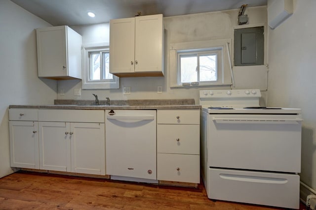 kitchen with white cabinetry, white appliances, electric panel, and light hardwood / wood-style floors