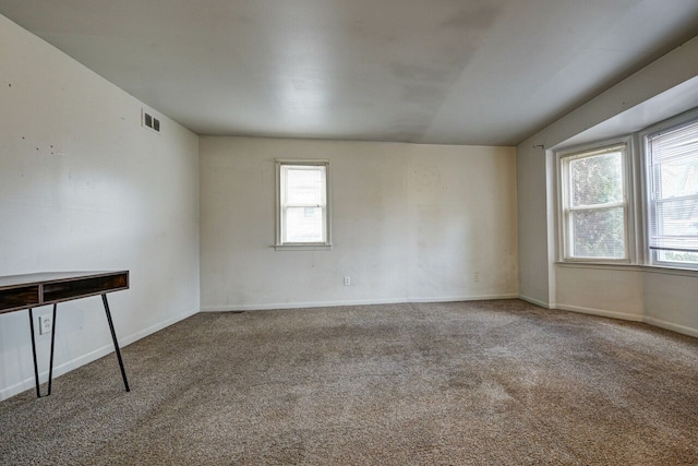 unfurnished room with carpet