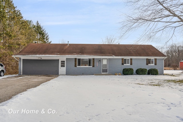 ranch-style home with a garage