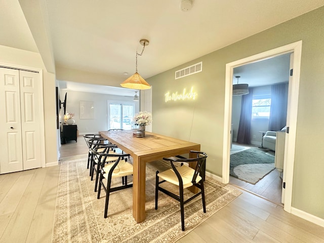 dining room featuring light wood-type flooring