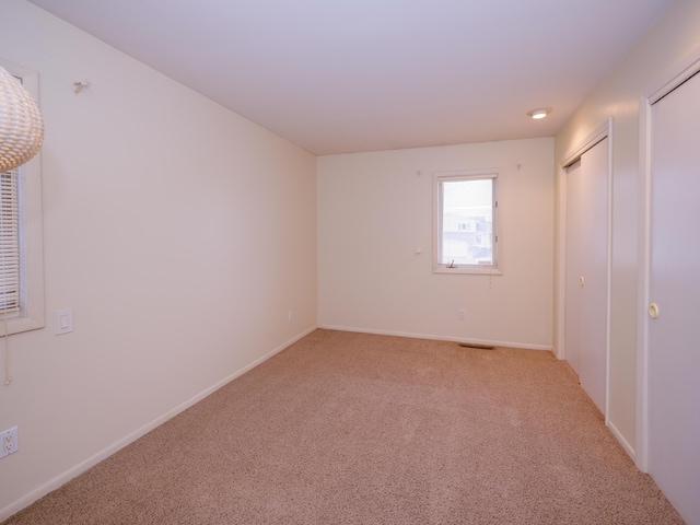 view of carpeted spare room