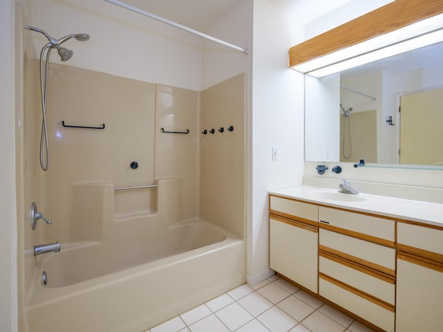 bathroom with vanity, bathing tub / shower combination, and tile patterned flooring