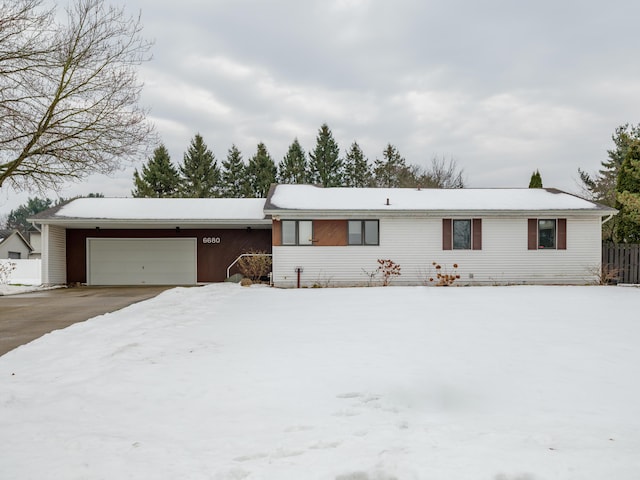 single story home with a garage