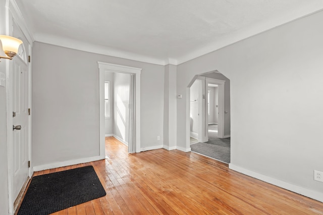 unfurnished room with light hardwood / wood-style floors