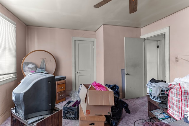 home office featuring carpet floors, a healthy amount of sunlight, and ceiling fan